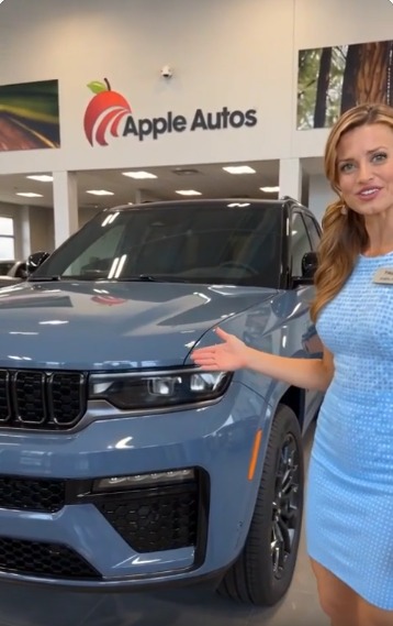 The same Jeep inside the Apple Autos showroom, presented by Paige